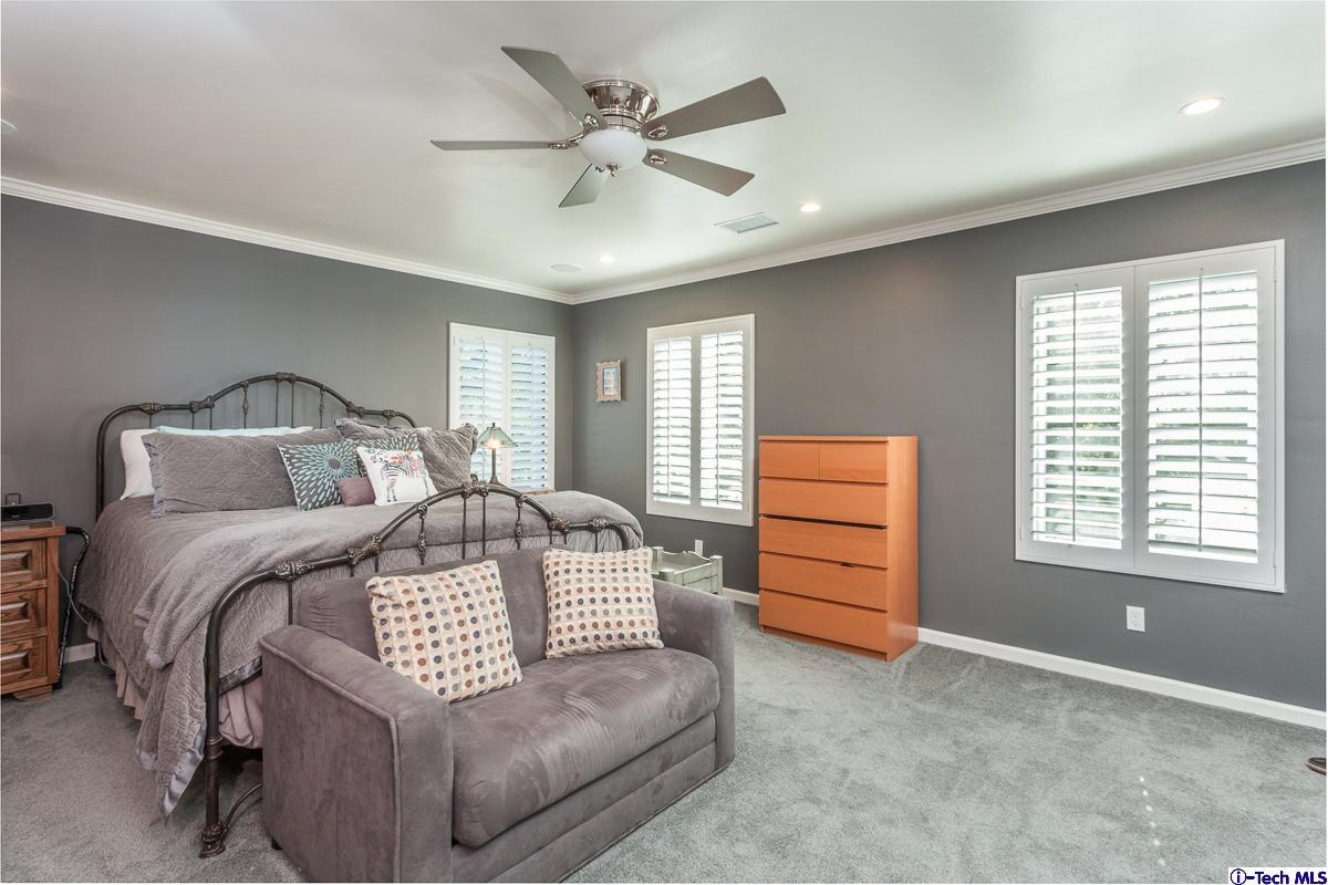 2017 Midwick Drive Altadena, CA 91001 - Photo 23 of 61 a bedroom with a bed and a dresser with the shoe rack