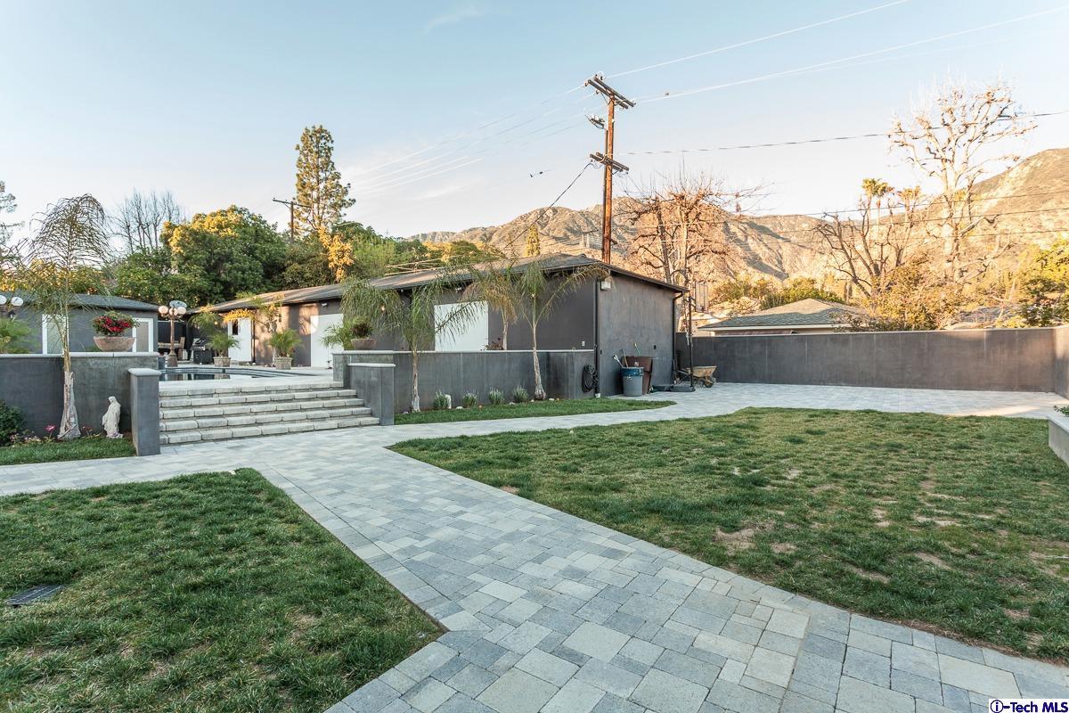 2017 Midwick Drive Altadena, CA 91001 - Photo 48 of 61 a view of a house with a yard and plants
