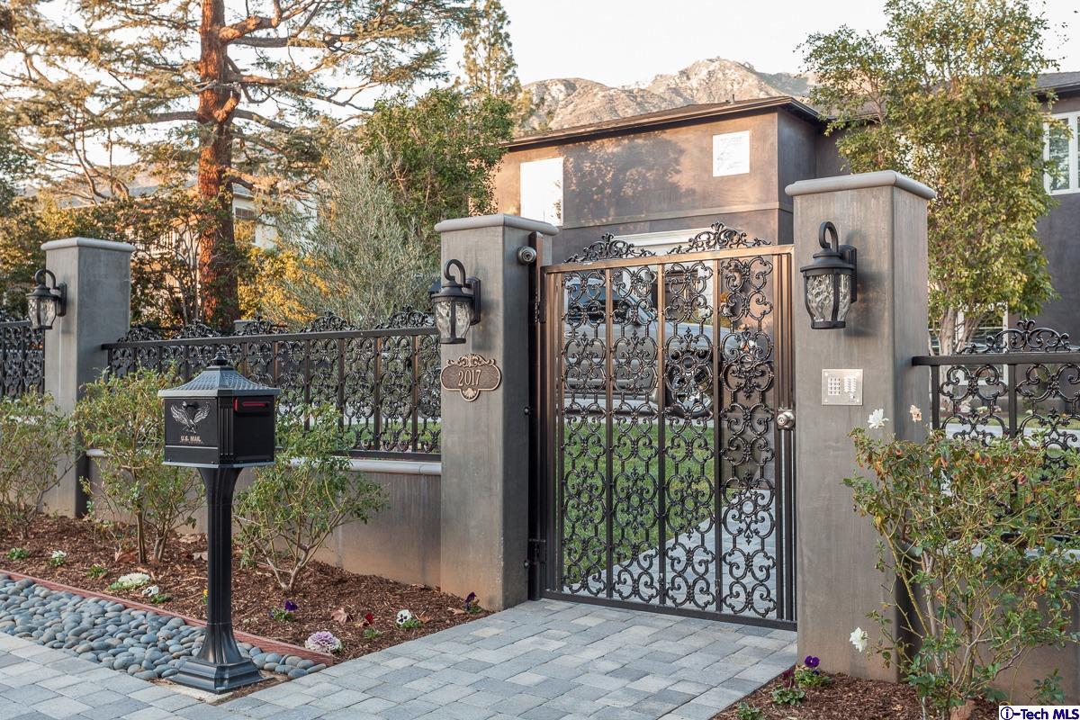 2017 Midwick Drive Altadena, CA 91001 - Photo 59 of 61 a front view of a house with garden
