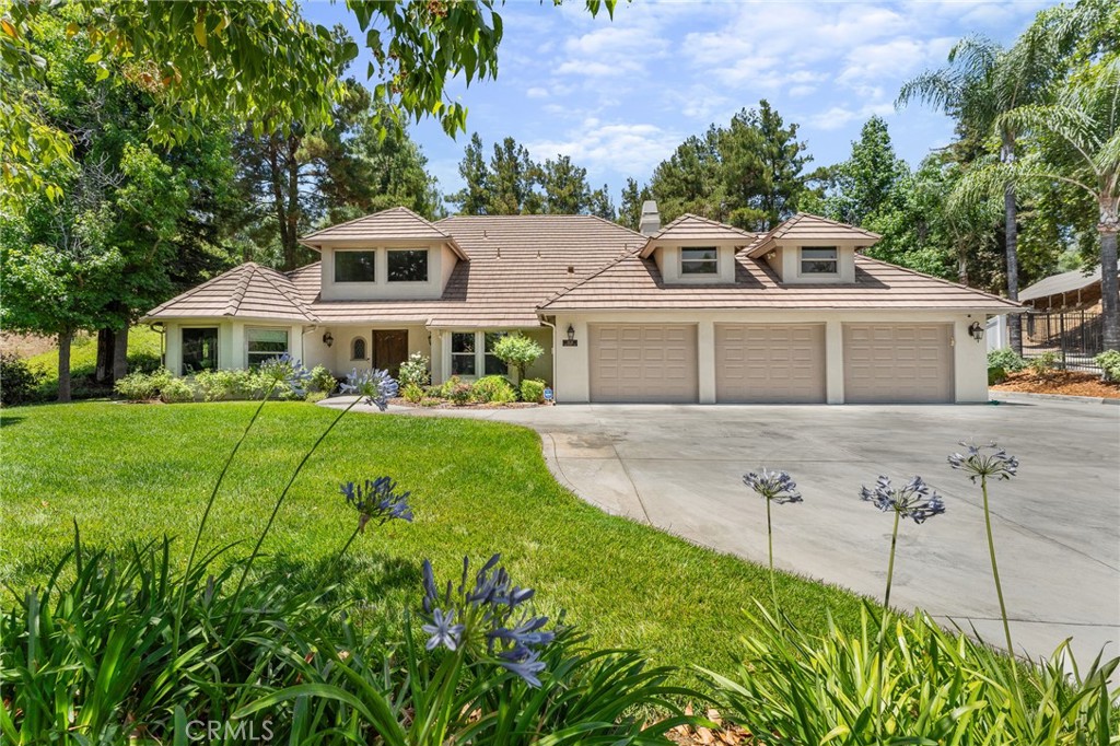 1624 Alessandro Road Redlands, CA 92373 - Photo 1 of 58 a front view of house with yard and green space
