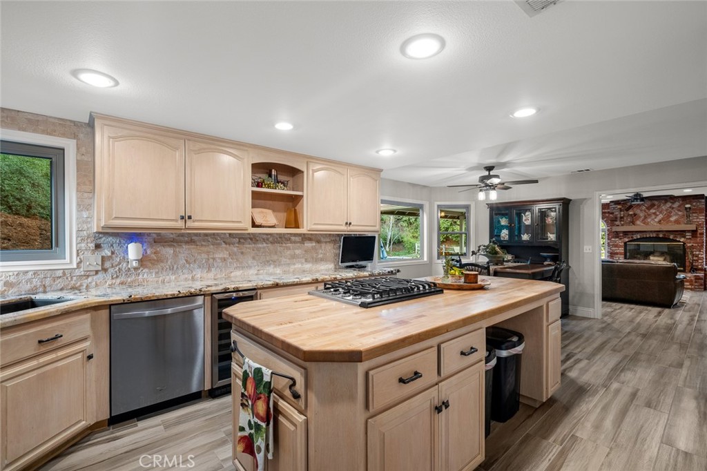 1624 Alessandro Road Redlands, CA 92373 - Photo 11 of 58 a kitchen with a stove and a sink