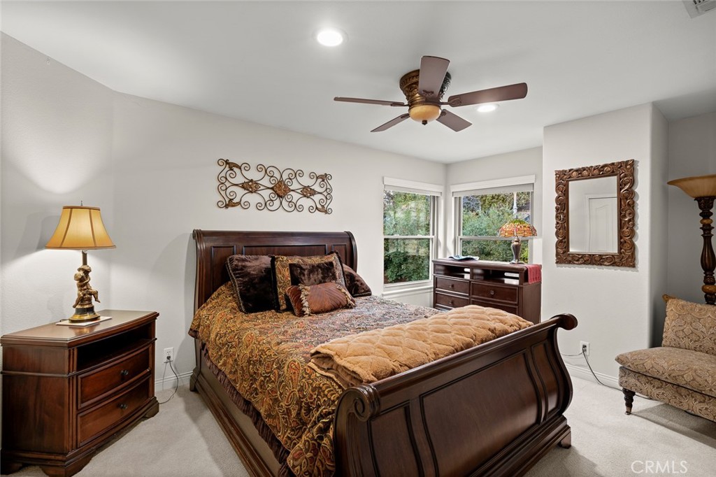 1624 Alessandro Road Redlands, CA 92373 - Photo 32 of 58 a bedroom with a bed and wooden floor