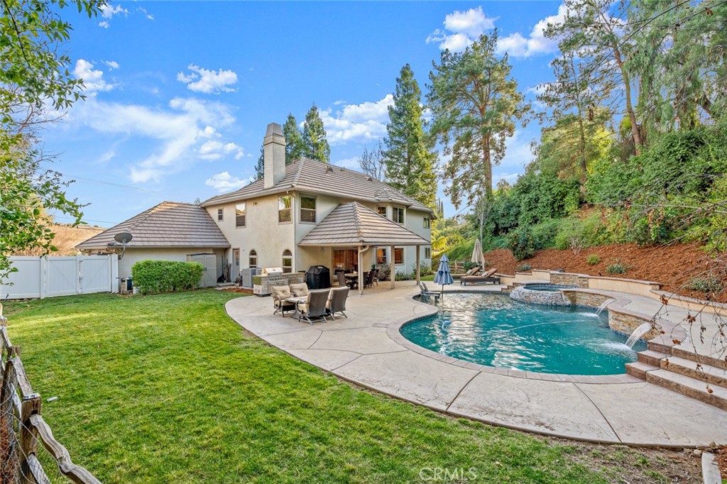 1624 Alessandro Road Redlands, CA 92373 - Photo 41 of 58 a view of a patio with chairs and potted plants
