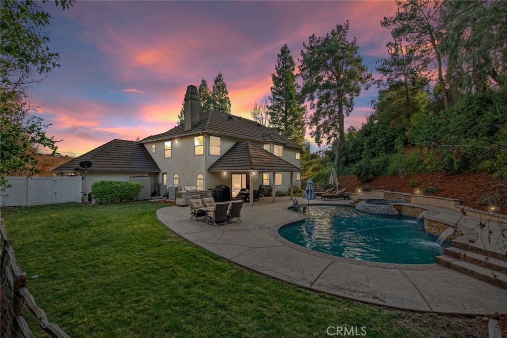 1624 Alessandro Road Redlands, CA 92373 - Photo 44 of 58 a view of a house with backyard sitting area and garden