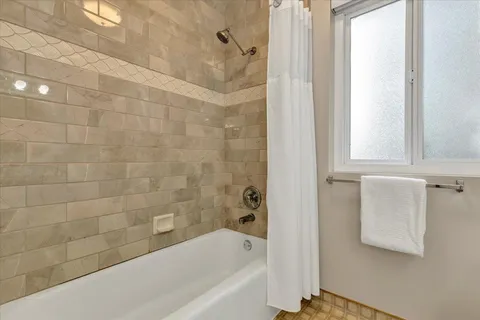 a bathroom with a bathtub