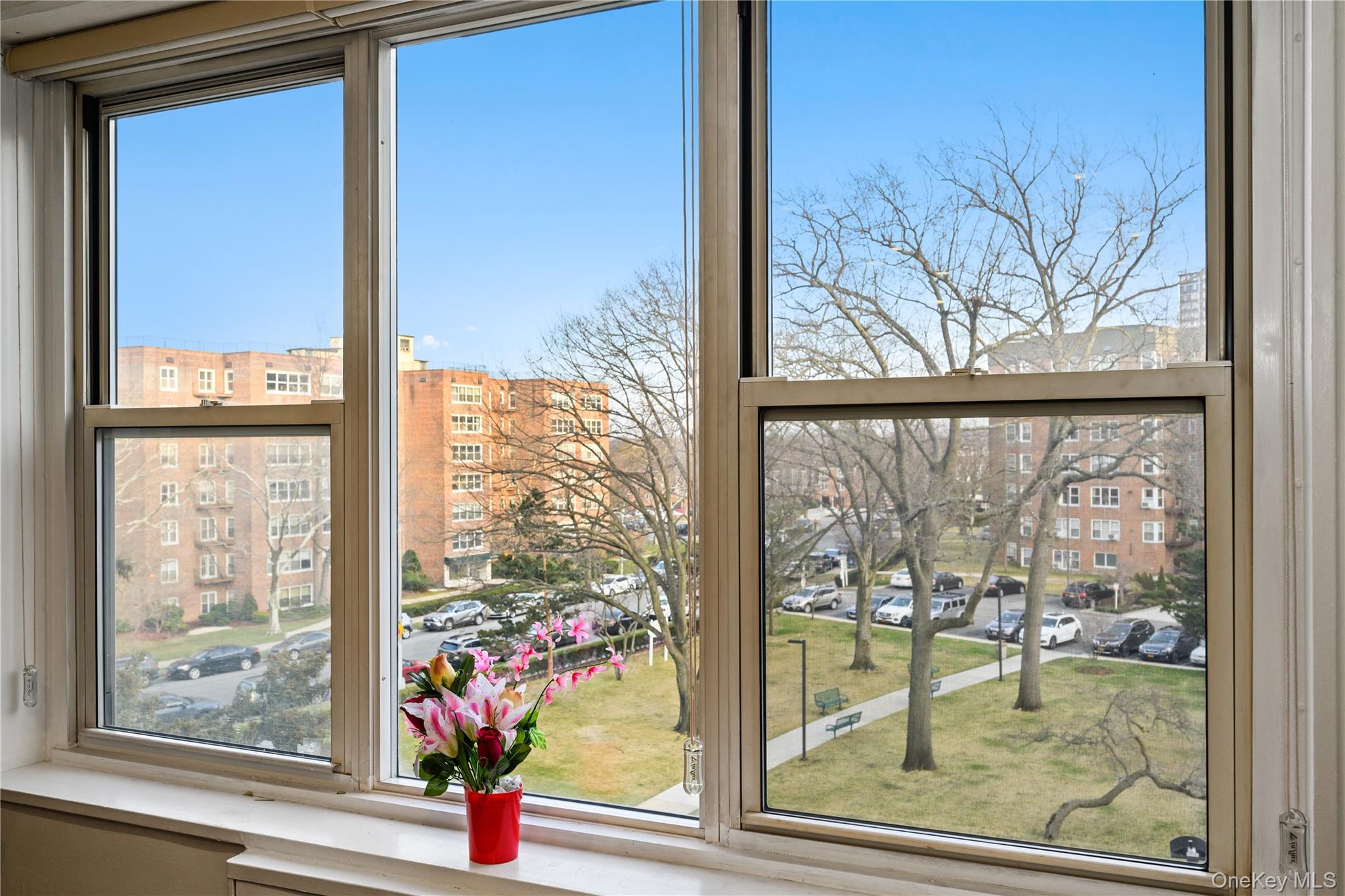 18-40 211th Street, Unit 4E Queens, NY 11360 - Photo 1 of 12 a view of water view from a window