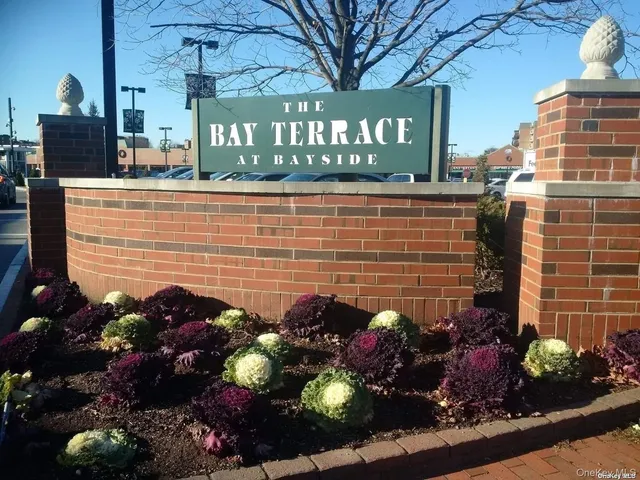 a view of a street with a bunch of flowers