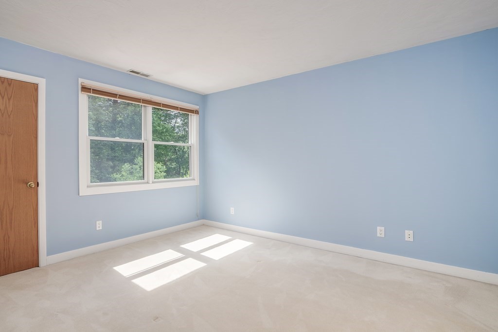 246 Elizabeth Ridge Road Carlisle, MA 01741 - Photo 31 of 38 an empty room with a window