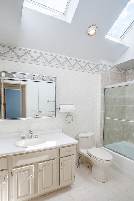 246 Elizabeth Ridge Road Carlisle, MA 01741 - Photo 33 of 38 a bathroom with a granite countertop toilet sink and a shower