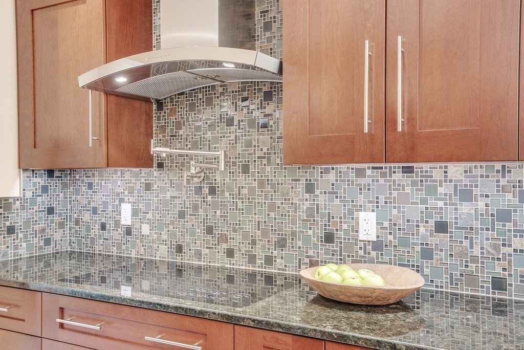 246 Elizabeth Ridge Road Carlisle, MA 01741 - Photo 38 of 38 a bathroom with a granite countertop sink and a mirror