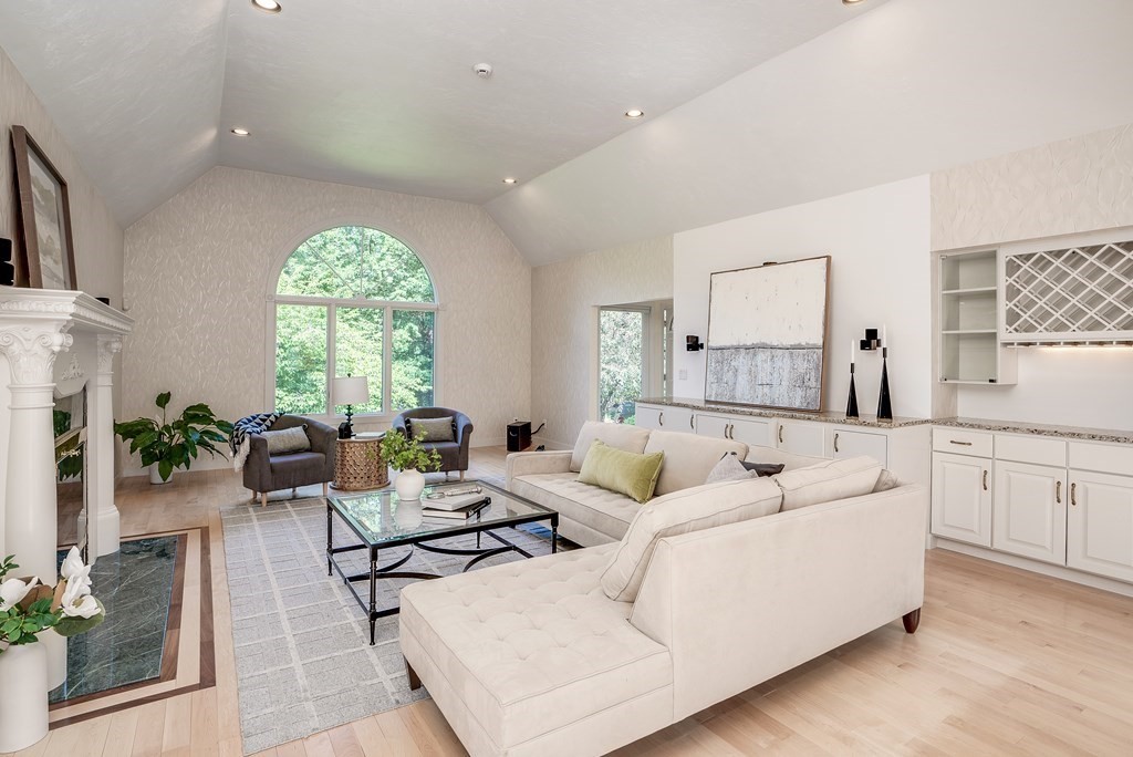 246 Elizabeth Ridge Road Carlisle, MA 01741 - Photo 10 of 38 a living room with furniture and a large window
