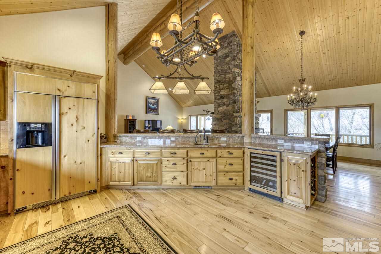 40 Grannie Lane Wellington, NV 89444 - Photo 11 of 40 a spacious bathroom with a granite countertop sink a mirror a bathtub and shower