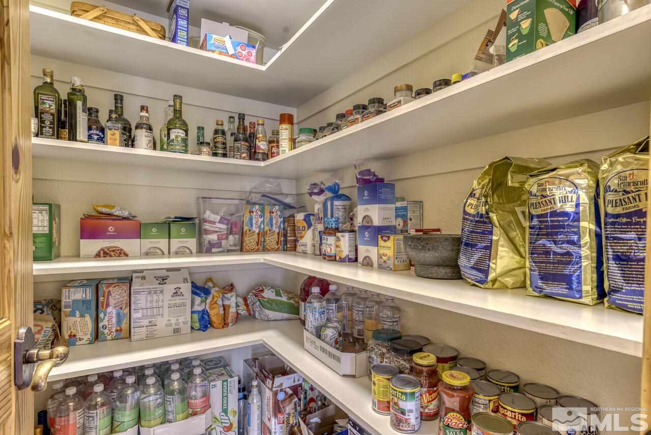 40 Grannie Lane Wellington, NV 89444 - Photo 13 of 40 a cabinet in a room with lots of different kinds of stuff