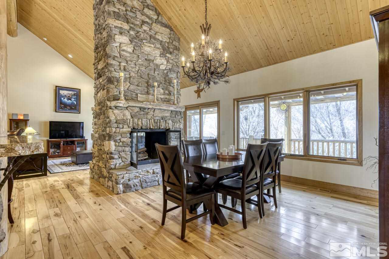 40 Grannie Lane Wellington, NV 89444 - Photo 14 of 40 a view of a dining room with furniture window and wooden floor