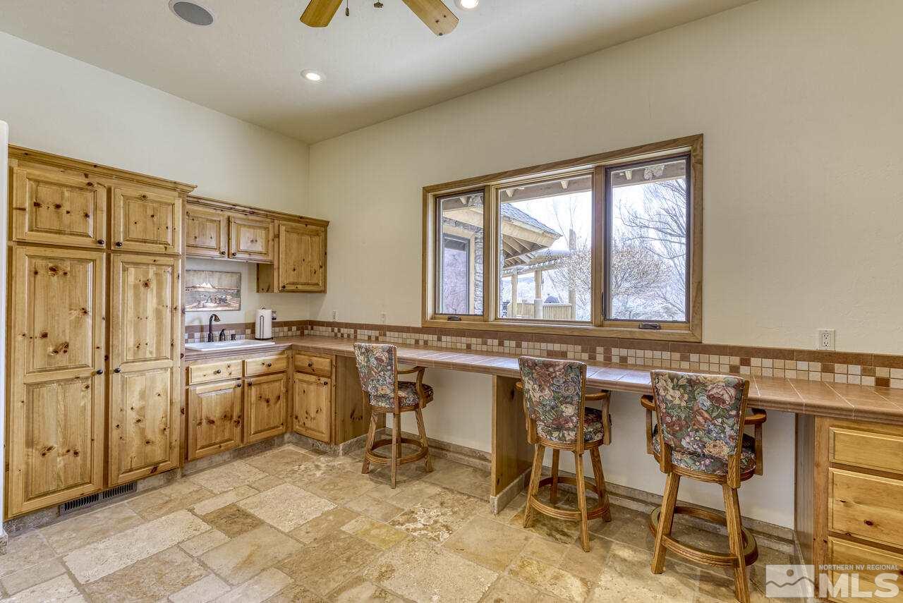 40 Grannie Lane Wellington, NV 89444 - Photo 23 of 40 a view of a kitchen with appliances and furniture