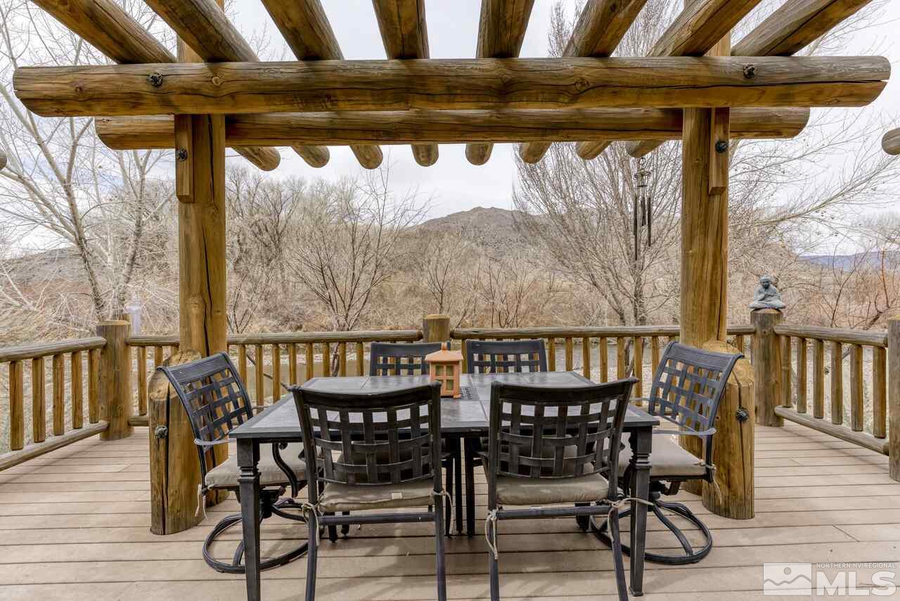 40 Grannie Lane Wellington, NV 89444 - Photo 30 of 40 a view of balcony with furniture and wooden floor