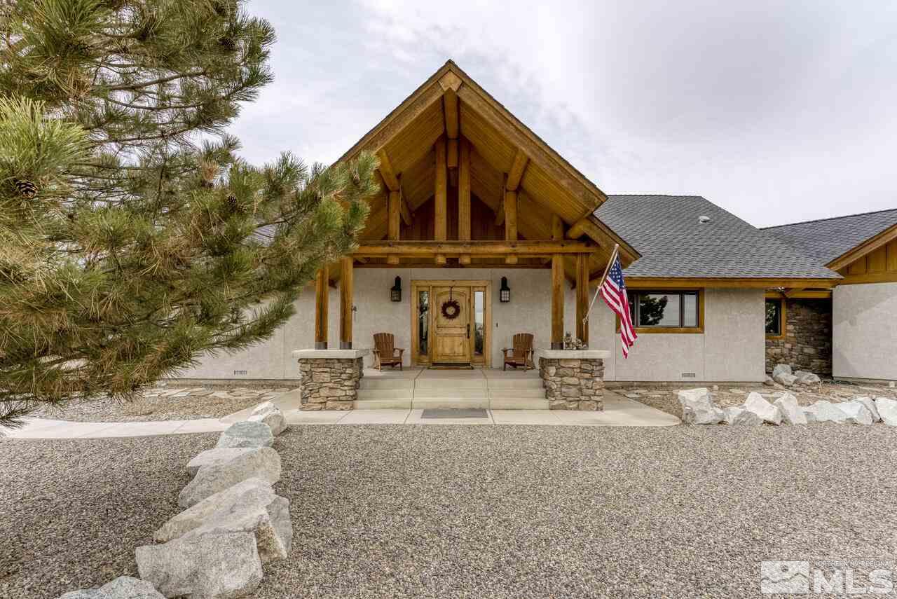 40 Grannie Lane Wellington, NV 89444 - Photo 3 of 40 a front view of a house with a yard