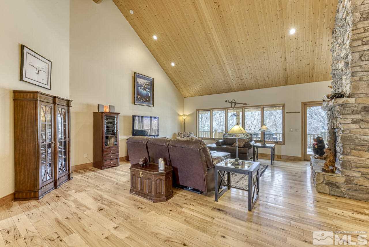 40 Grannie Lane Wellington, NV 89444 - Photo 5 of 40 a living room with furniture and a fireplace