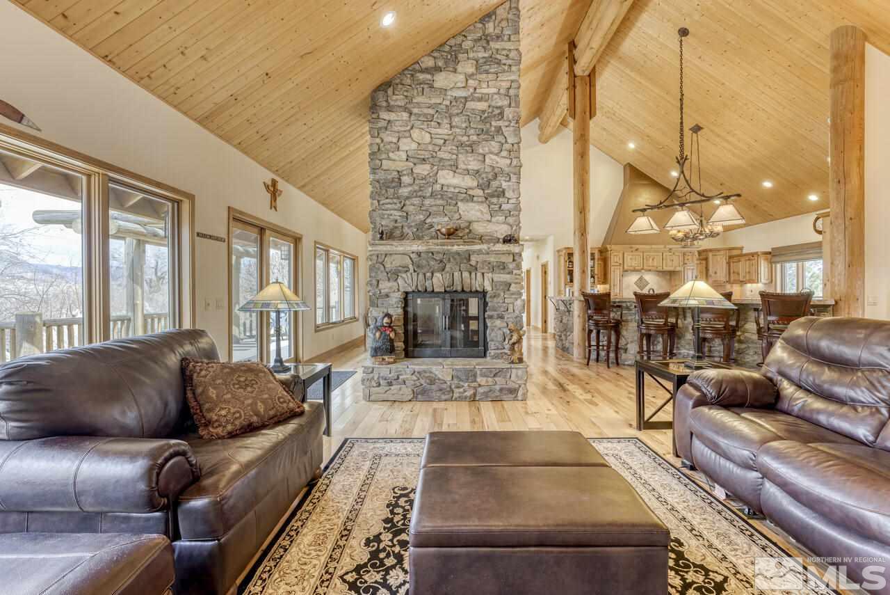 40 Grannie Lane Wellington, NV 89444 - Photo 6 of 40 a living room with furniture and a fireplace