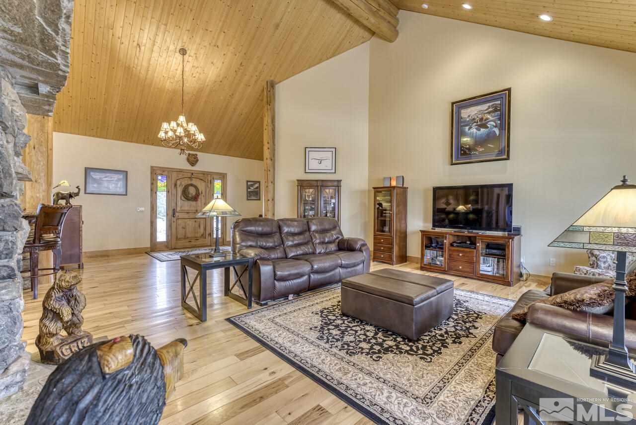 40 Grannie Lane Wellington, NV 89444 - Photo 8 of 40 a living room with furniture and a flat screen tv