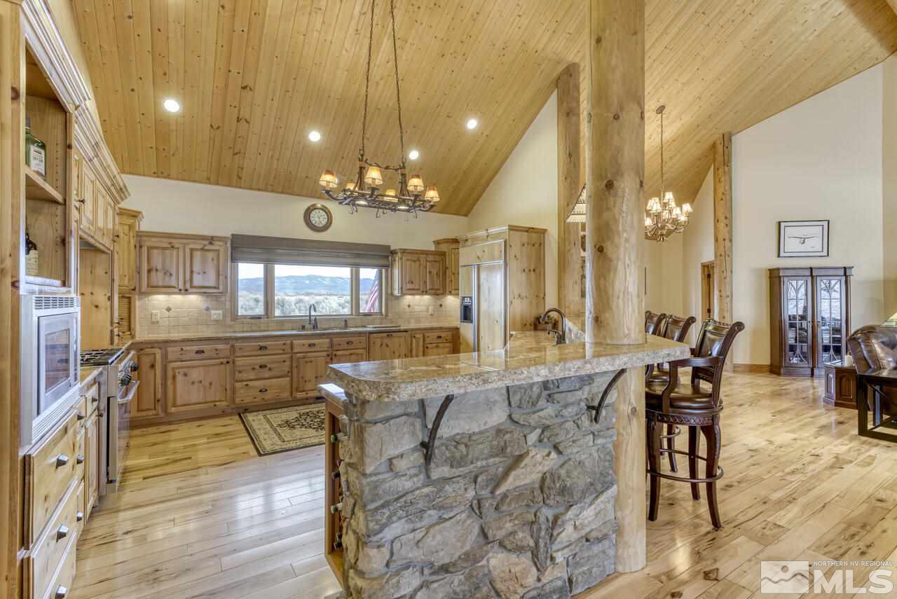 40 Grannie Lane Wellington, NV 89444 - Photo 10 of 40 a view of a dining room with furniture and chandelier