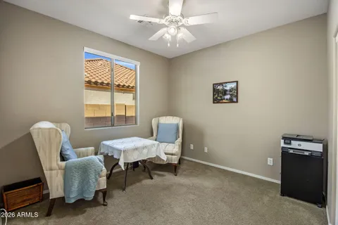 a living room with furniture and a window