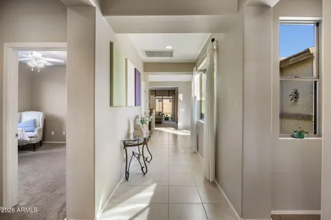 a en suite bathroom with a toilet sink and mirror
