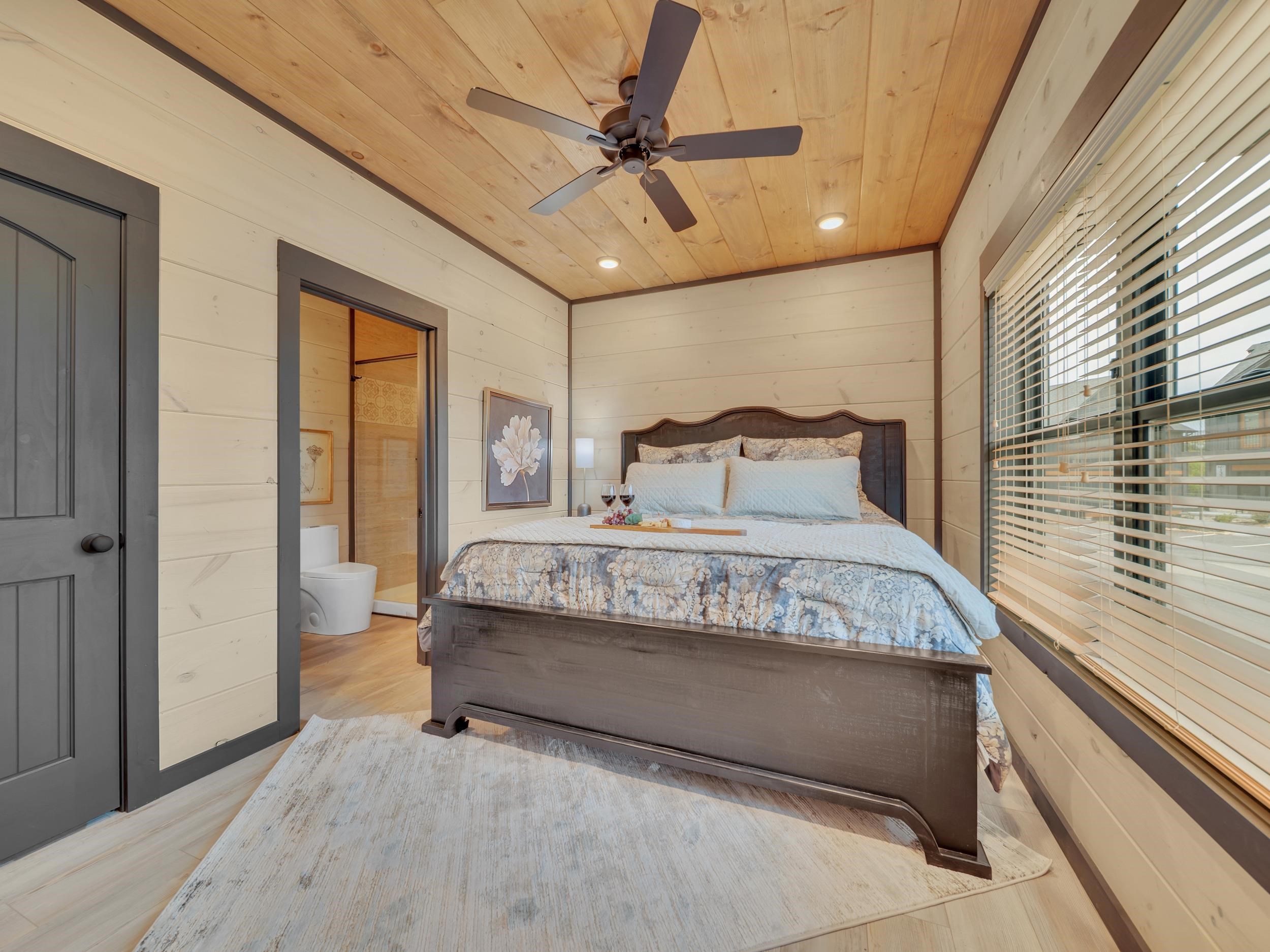 1319 Wildhorse Ridge Way, Unit LOT 143R Sevierville, TN 37862 - Photo 12 of 39 a bedroom with a bed and window