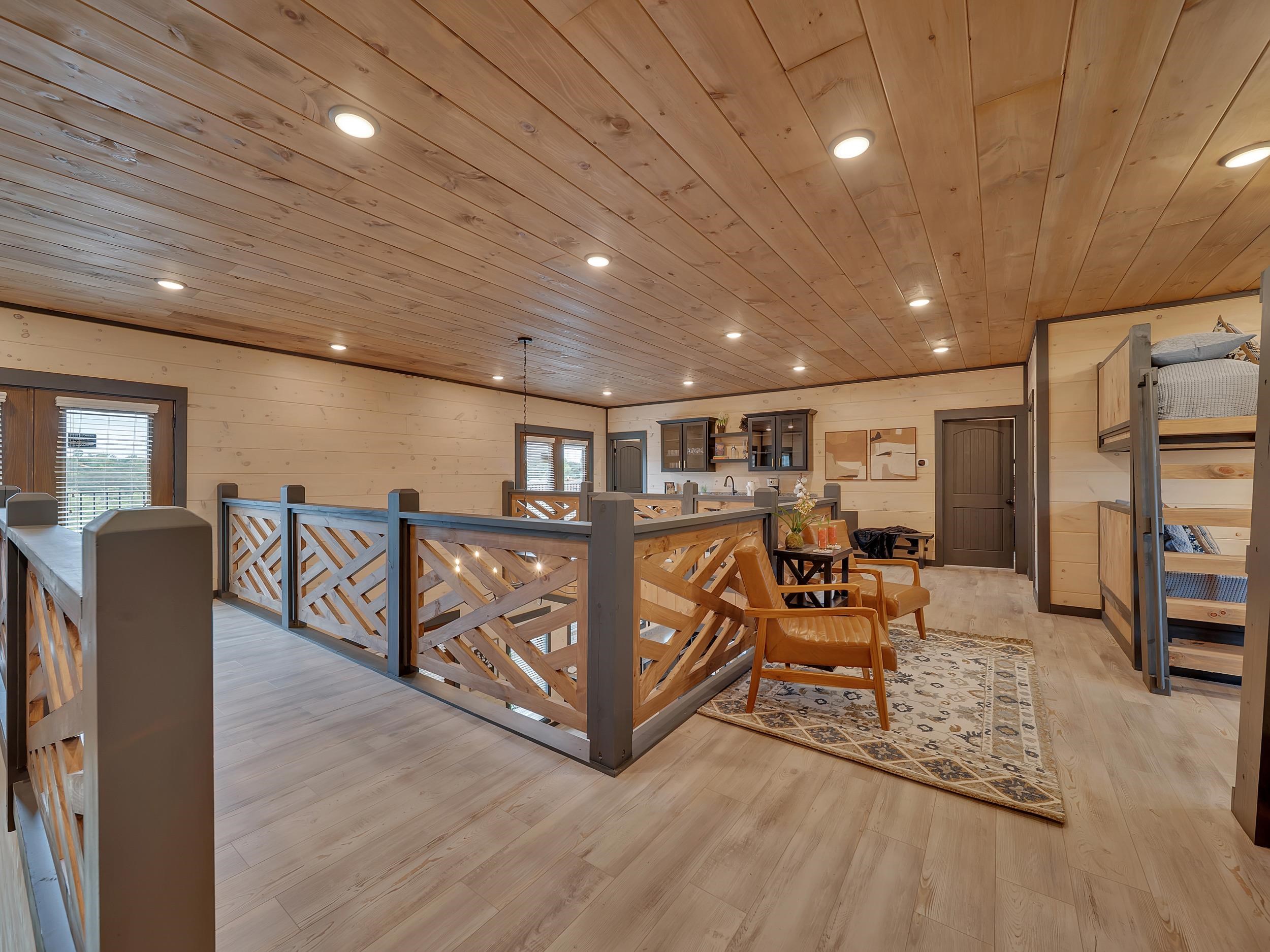 1319 Wildhorse Ridge Way, Unit LOT 143R Sevierville, TN 37862 - Photo 14 of 39 a living room with furniture