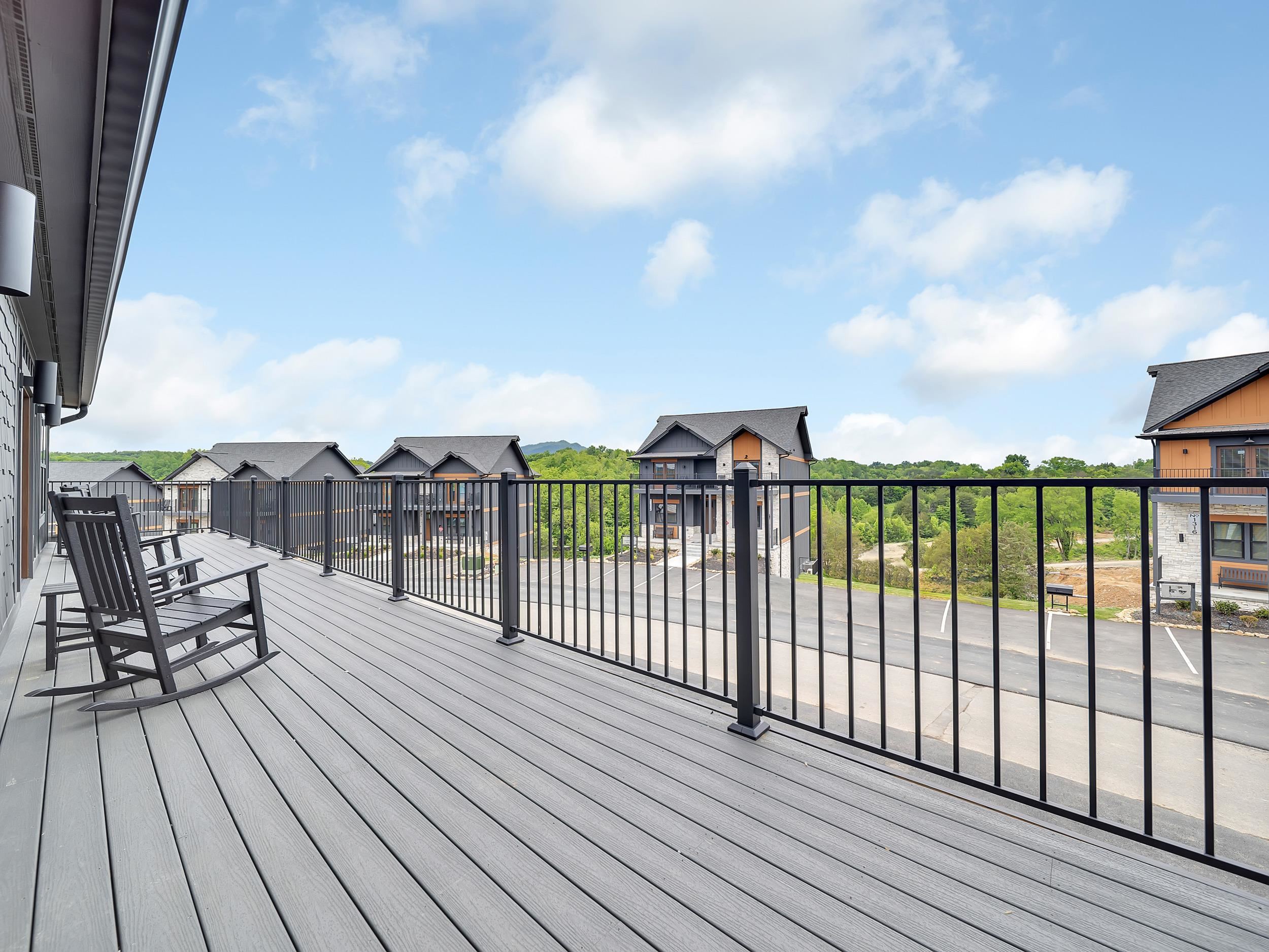 1319 Wildhorse Ridge Way, Unit LOT 143R Sevierville, TN 37862 - Photo 22 of 39 a view of a balcony with furniture