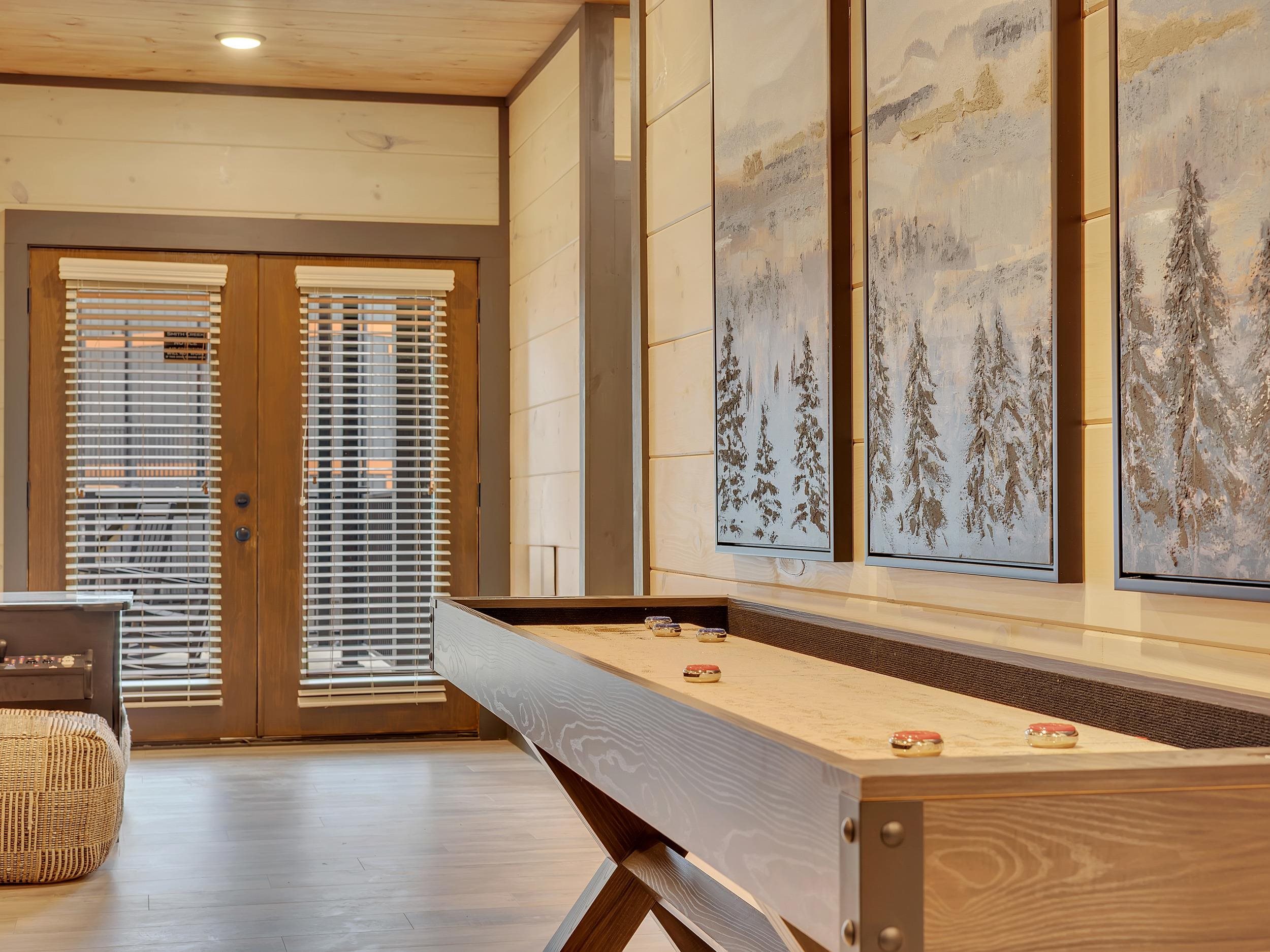 1319 Wildhorse Ridge Way, Unit LOT 143R Sevierville, TN 37862 - Photo 26 of 39 a view of a room with a large window and wooden floor