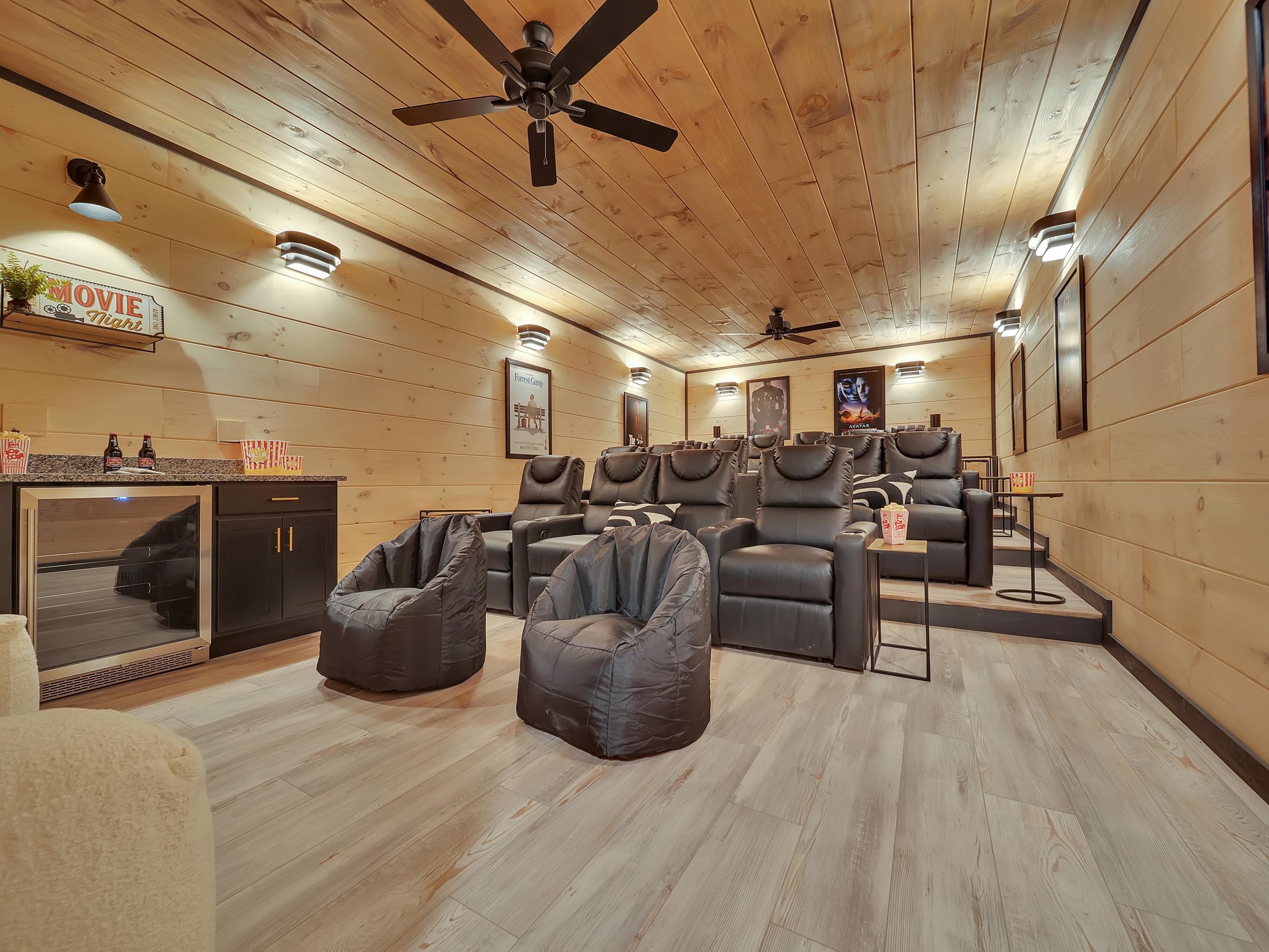 1319 Wildhorse Ridge Way, Unit LOT 143R Sevierville, TN 37862 - Photo 28 of 39 a living room with lots of furniture and a chandelier