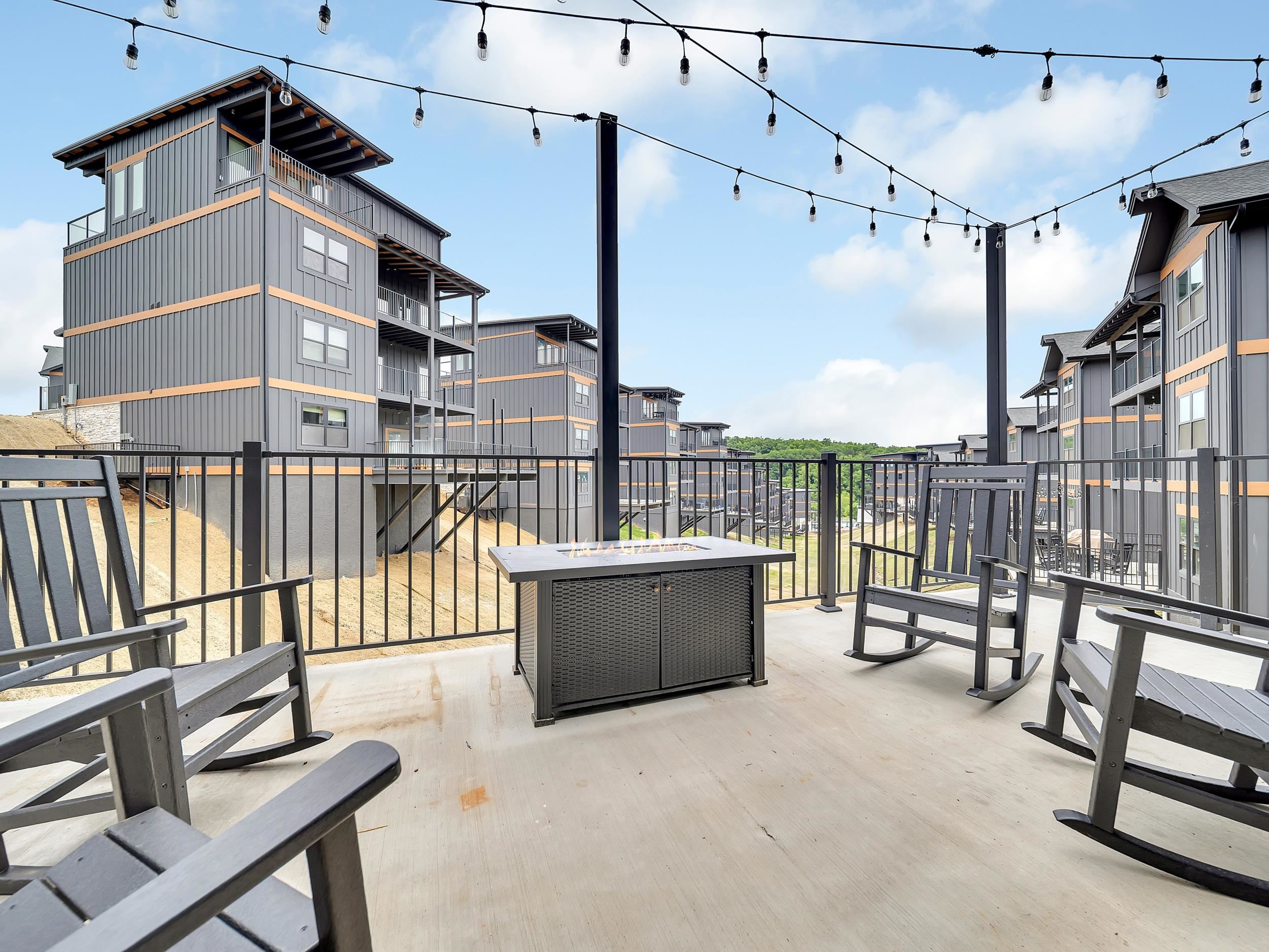 1319 Wildhorse Ridge Way, Unit LOT 143R Sevierville, TN 37862 - Photo 31 of 39 a roof deck with a couch and a potted plant on it