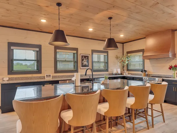 a view of a dining room with furniture