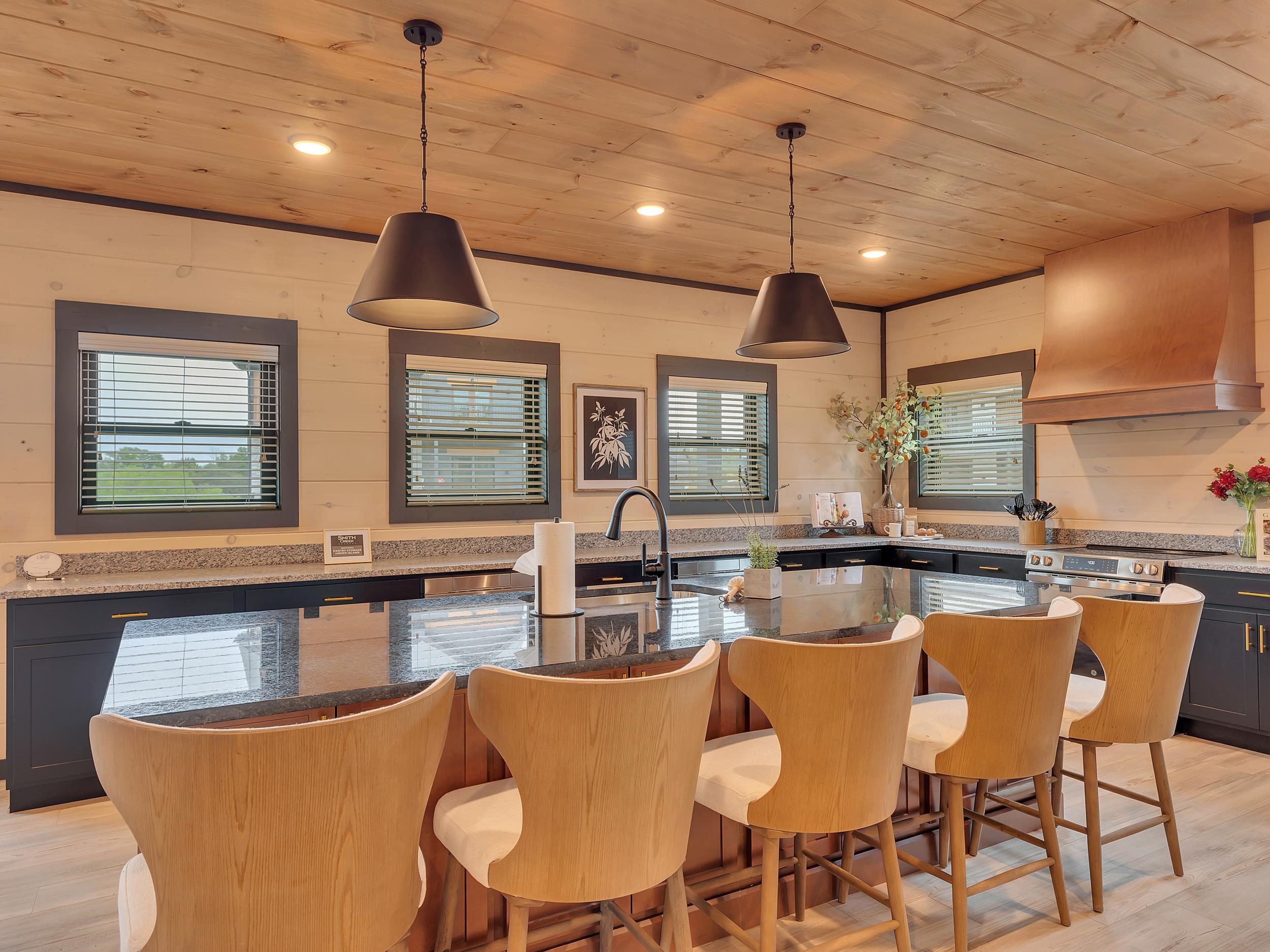 1319 Wildhorse Ridge Way, Unit LOT 143R Sevierville, TN 37862 - Photo 4 of 39 a view of a dining room with furniture window and wooden floor