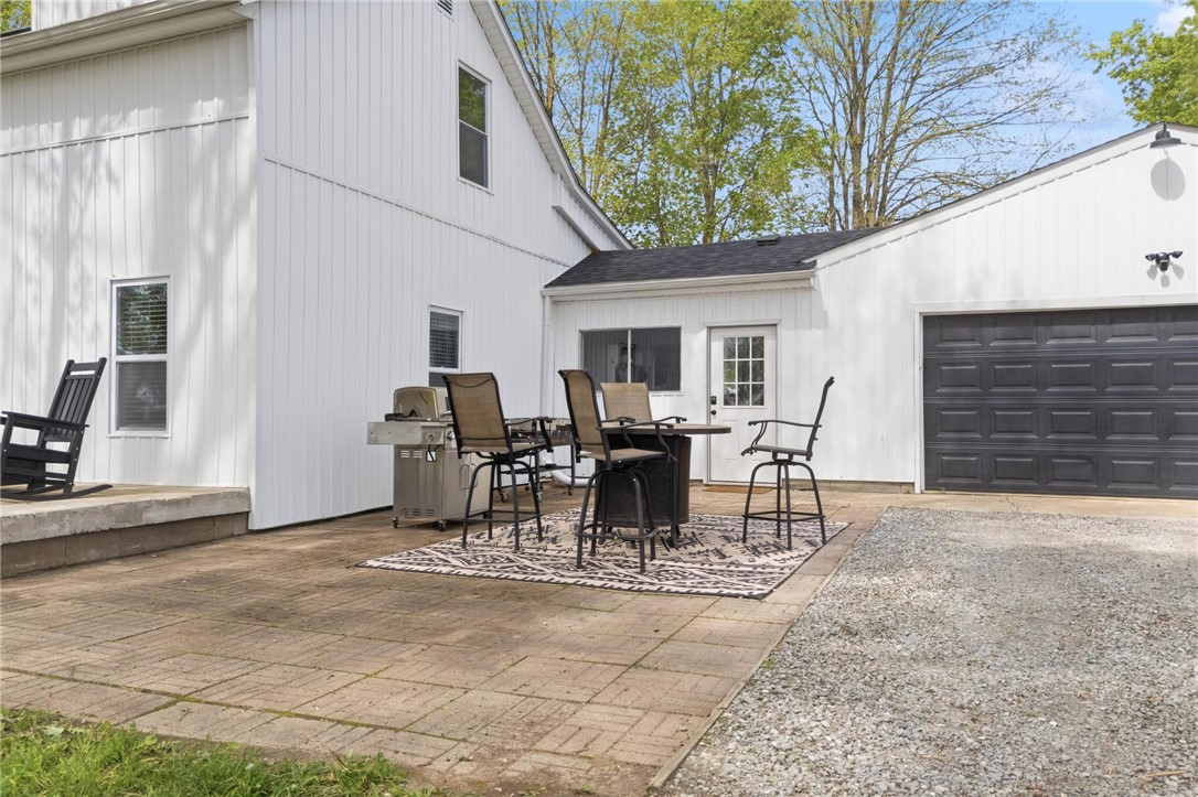 2950 Fairfield Pike Springfield, OH 45502 - Photo 4 of 48 This inviting patio space offers seamless outdoor living, perfect for entertaining or quiet relaxation.