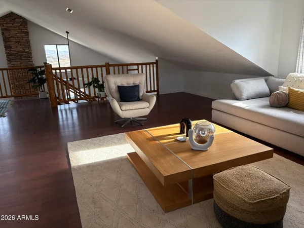 a living room with dining table