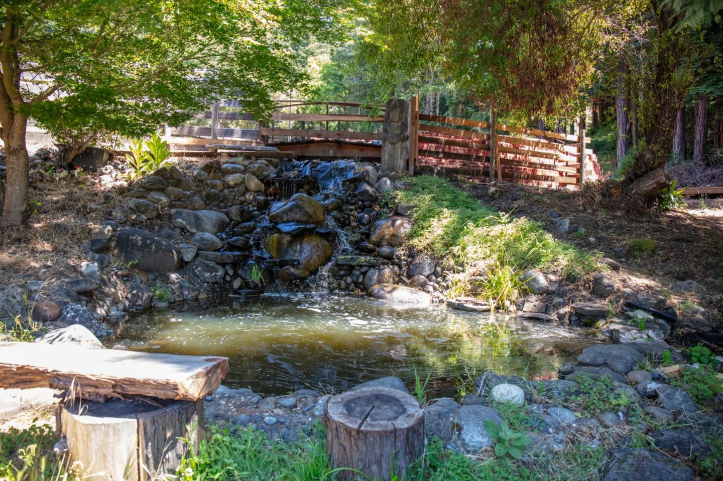 1003 Laurel Glen Road Soquel, CA 95073 - Photo 59 of 101 a backyard of a house with lots of green space