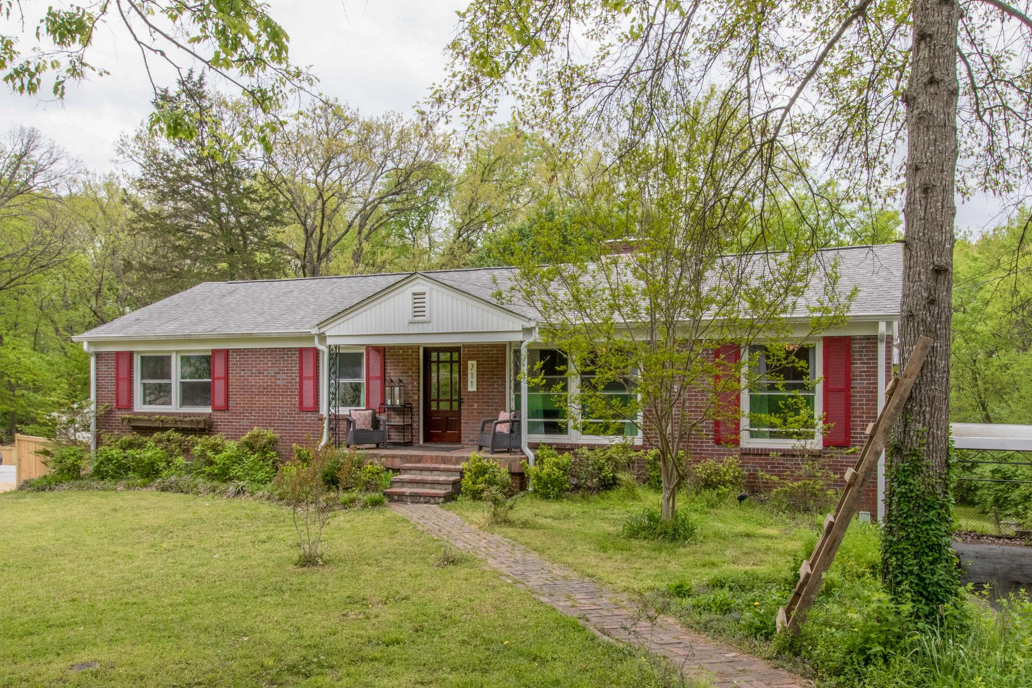 711 Starlit Road Nashville, TN 37205 - Photo 1 of 21 Charming mid-century modern ranch just 4 miles from West End, 1 mile to Nashville West