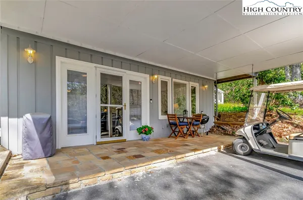 a view of a chairs in front of house