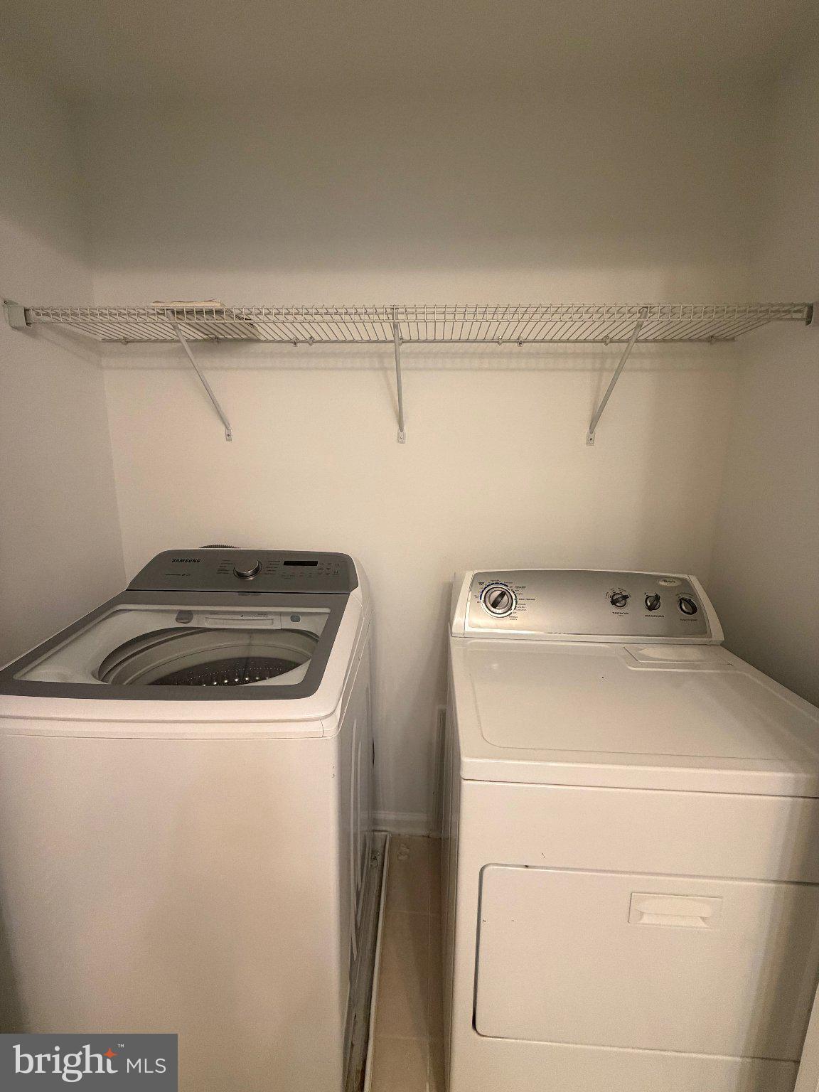 42724 Redpath Terrace Ashburn, VA 20147 - Photo 12 of 14 Efficient laundry space for modern living.