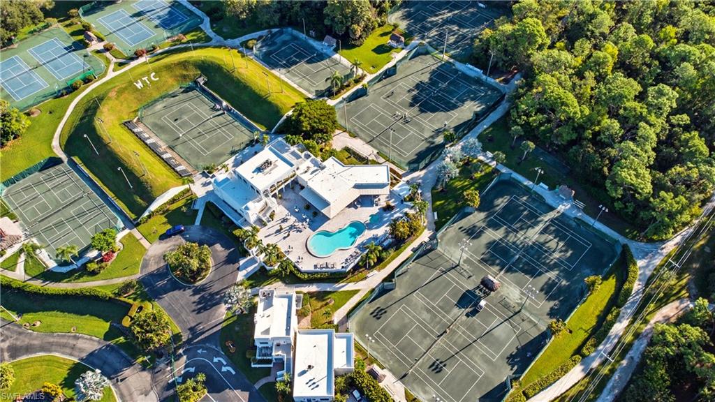 3605 Corinthian Way Naples, FL 34105 - Photo 28 of 34 an aerial view of a house with a swimming pool