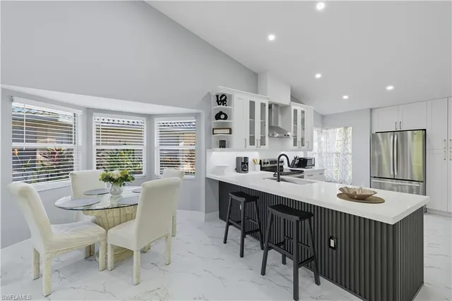 a view of kitchen with breakfast area