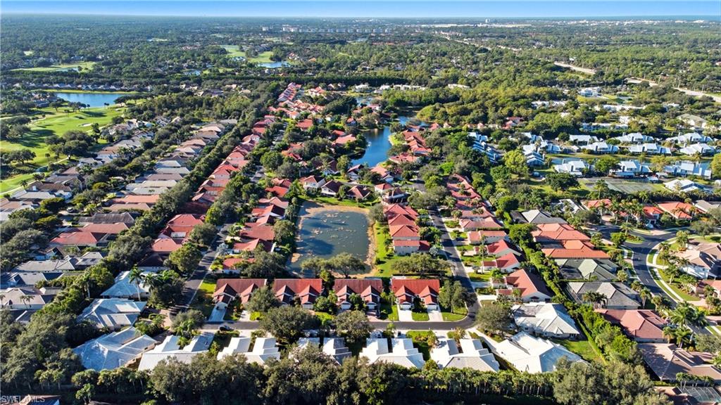 3605 Corinthian Way Naples, FL 34105 - Photo 31 of 34 an aerial view of multiple house