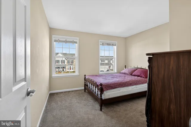 a white bath tub sitting in a bathroom