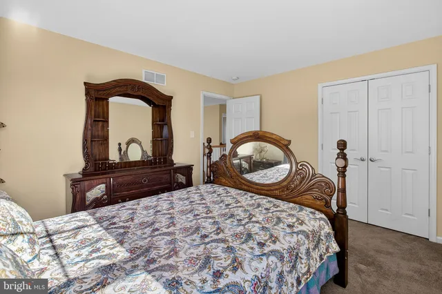 a view of an empty room with stairs