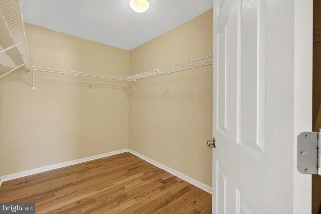 a view of a chairs and table in the balcony
