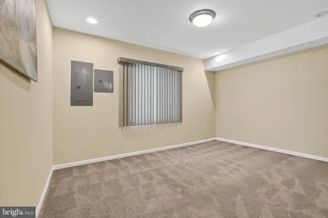 an aerial view of a house with outdoor space