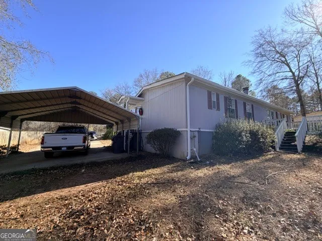 a house view with a outdoor space