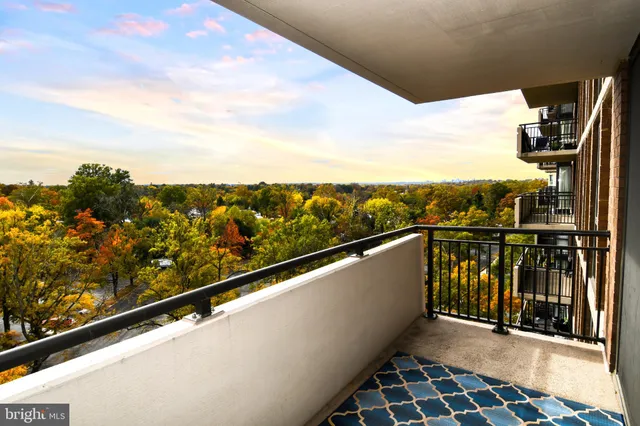 a kitchen with stainless steel appliances granite countertop a stove a refrigerator and a microwave